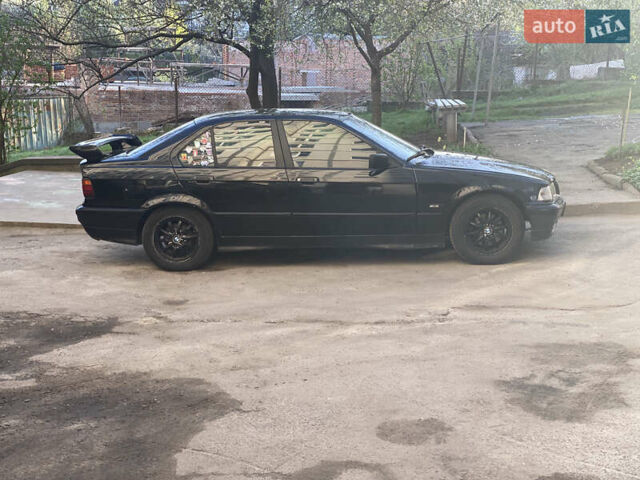 Черный БМВ 3 Серия, объемом двигателя 1.8 л и пробегом 500 тыс. км за 2600 $, фото 1 на Automoto.ua