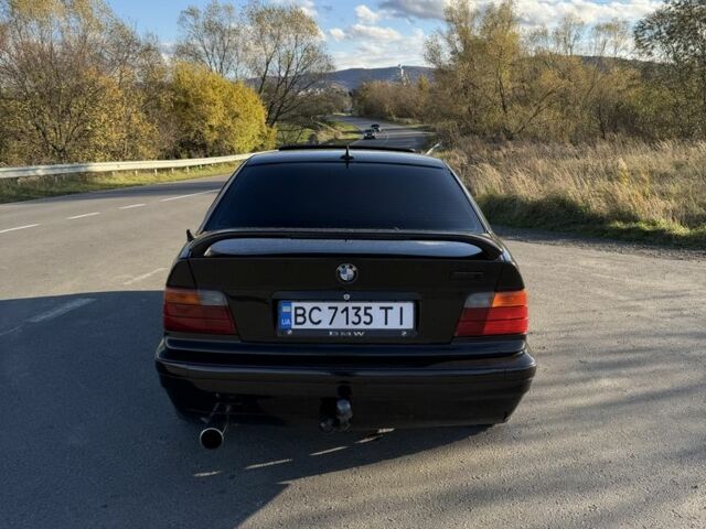 Черный БМВ 3 Серия, объемом двигателя 1.8 л и пробегом 368 тыс. км за 2550 $, фото 8 на Automoto.ua