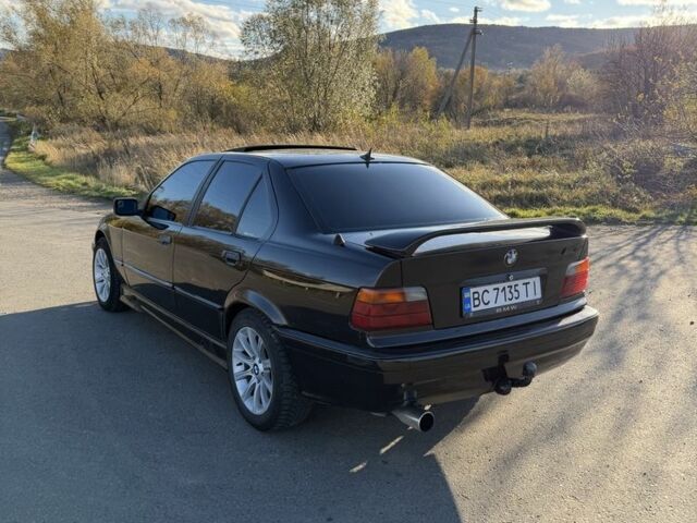 Черный БМВ 3 Серия, объемом двигателя 1.8 л и пробегом 368 тыс. км за 2550 $, фото 10 на Automoto.ua