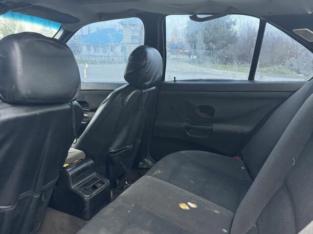 Черный БМВ 3 Серия, объемом двигателя 1.8 л и пробегом 358 тыс. км за 1000 $, фото 5 на Automoto.ua