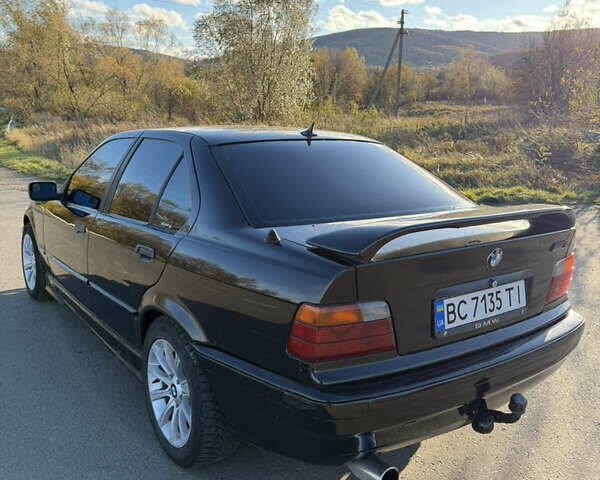 Черный БМВ 3 Серия, объемом двигателя 1.8 л и пробегом 368 тыс. км за 2499 $, фото 14 на Automoto.ua