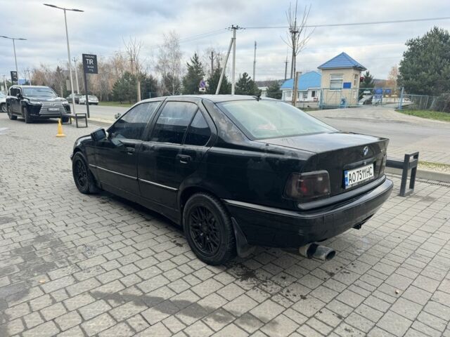Черный БМВ 3 Серия, объемом двигателя 1.8 л и пробегом 358 тыс. км за 1000 $, фото 4 на Automoto.ua