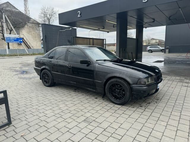 Черный БМВ 3 Серия, объемом двигателя 1.8 л и пробегом 358 тыс. км за 1000 $, фото 1 на Automoto.ua