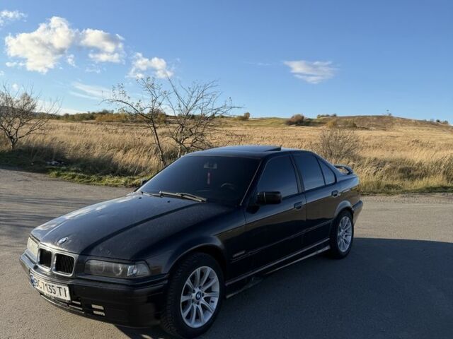 Черный БМВ 3 Серия, объемом двигателя 1.8 л и пробегом 368 тыс. км за 2550 $, фото 1 на Automoto.ua