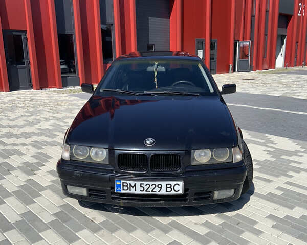 Черный БМВ 3 Серия, объемом двигателя 1.8 л и пробегом 290 тыс. км за 2990 $, фото 1 на Automoto.ua
