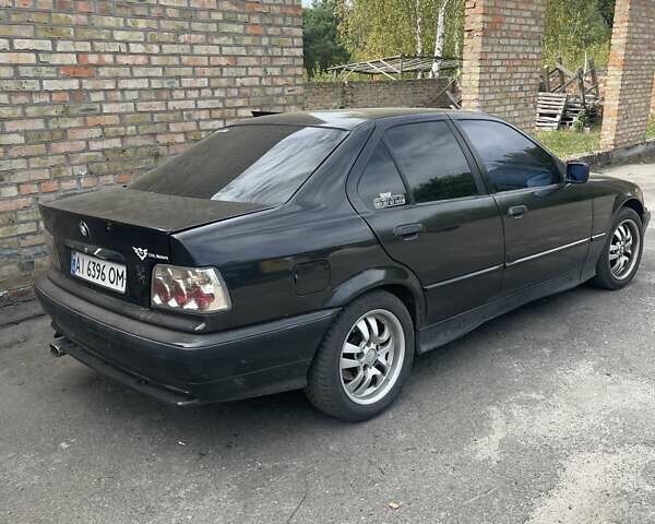 Черный БМВ 3 Серия, объемом двигателя 1.8 л и пробегом 280 тыс. км за 2500 $, фото 1 на Automoto.ua