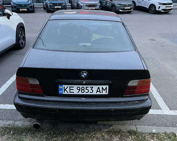 Черный БМВ 3 Серия, объемом двигателя 1.8 л и пробегом 316 тыс. км за 2100 $, фото 3 на Automoto.ua