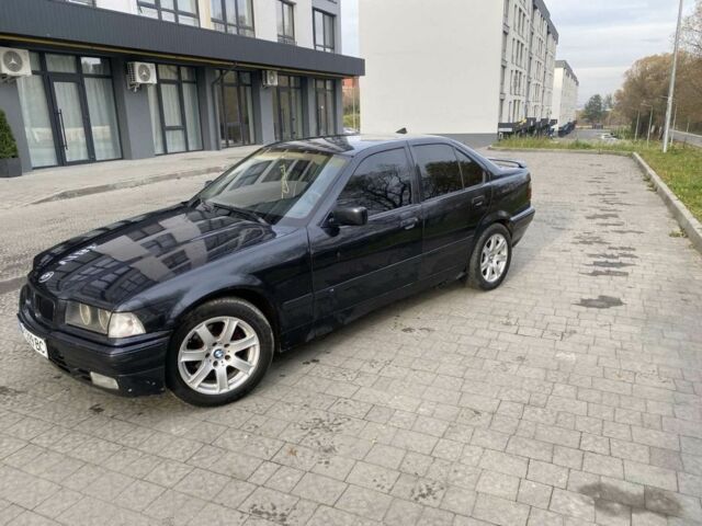 Чорний БМВ 3 Серія, об'ємом двигуна 1.8 л та пробігом 215 тис. км за 1900 $, фото 1 на Automoto.ua