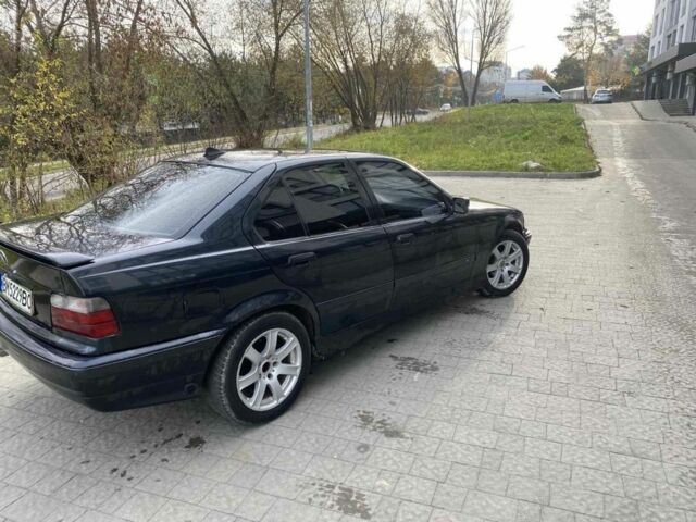 Чорний БМВ 3 Серія, об'ємом двигуна 1.8 л та пробігом 215 тис. км за 1900 $, фото 2 на Automoto.ua