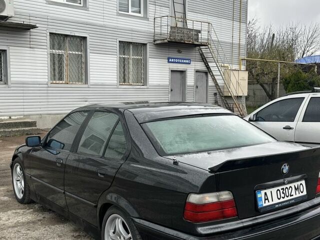 Черный БМВ 3 Серия, объемом двигателя 2.5 л и пробегом 390 тыс. км за 3600 $, фото 5 на Automoto.ua