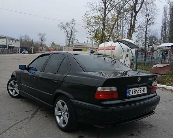 Черный БМВ 3 Серия, объемом двигателя 2.8 л и пробегом 450 тыс. км за 2799 $, фото 4 на Automoto.ua