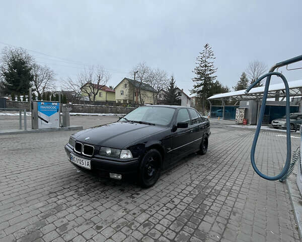 Черный БМВ 3 Серия, объемом двигателя 1.99 л и пробегом 245 тыс. км за 5200 $, фото 1 на Automoto.ua