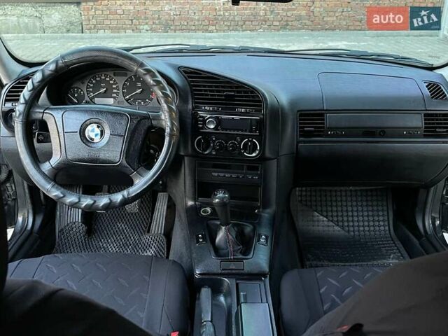 Черный БМВ 3 Серия, объемом двигателя 1.8 л и пробегом 250 тыс. км за 2850 $, фото 21 на Automoto.ua