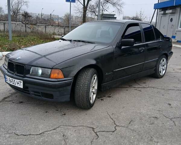 Черный БМВ 3 Серия, объемом двигателя 2.8 л и пробегом 450 тыс. км за 2799 $, фото 2 на Automoto.ua