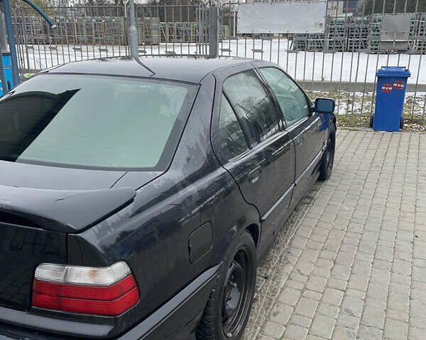 Черный БМВ 3 Серия, объемом двигателя 1.99 л и пробегом 245 тыс. км за 5200 $, фото 5 на Automoto.ua