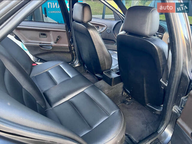 Чорний БМВ 3 Серія, об'ємом двигуна 1.8 л та пробігом 252 тис. км за 3400 $, фото 4 на Automoto.ua