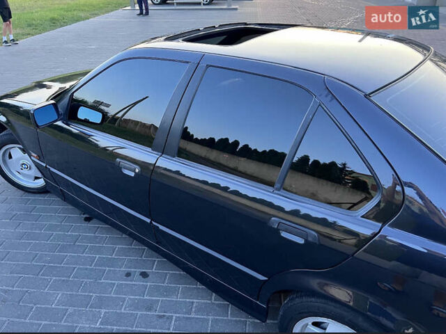 Чорний БМВ 3 Серія, об'ємом двигуна 1.8 л та пробігом 252 тис. км за 3400 $, фото 2 на Automoto.ua