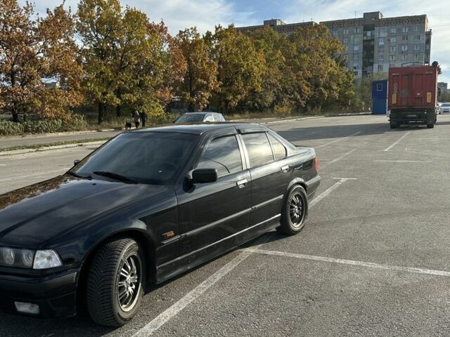 Черный БМВ 3 Серия, объемом двигателя 2.5 л и пробегом 425 тыс. км за 4700 $, фото 2 на Automoto.ua