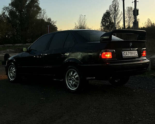 Чорний БМВ 3 Серія, об'ємом двигуна 2 л та пробігом 410 тис. км за 2800 $, фото 1 на Automoto.ua