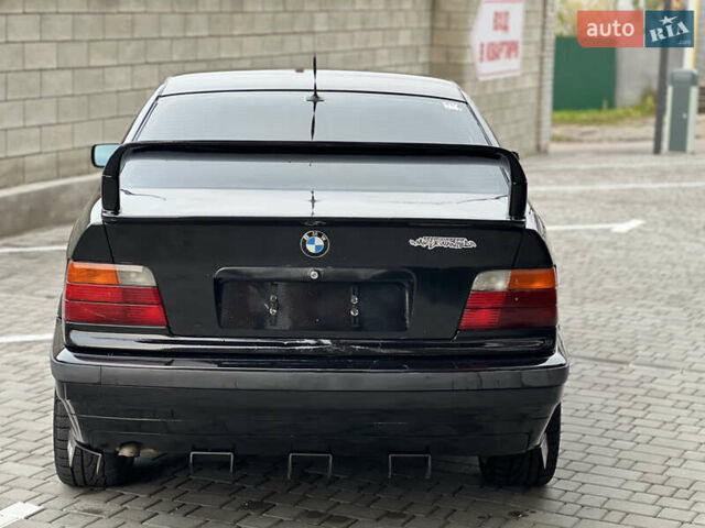 Чорний БМВ 3 Серія, об'ємом двигуна 2.5 л та пробігом 337 тис. км за 3999 $, фото 4 на Automoto.ua