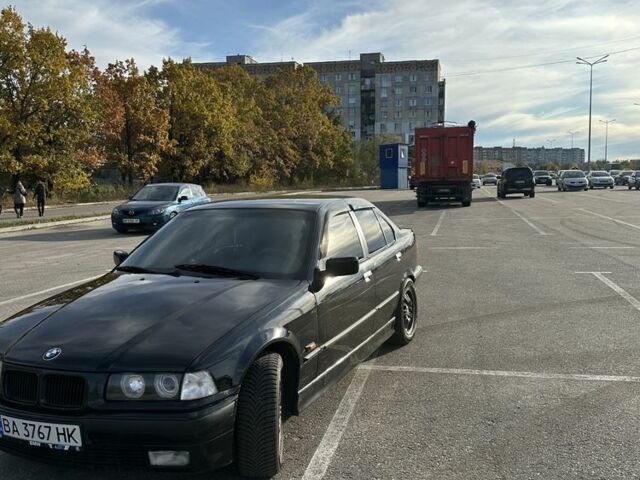 Черный БМВ 3 Серия, объемом двигателя 2.5 л и пробегом 425 тыс. км за 4700 $, фото 1 на Automoto.ua