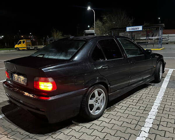 Чорний БМВ 3 Серія, об'ємом двигуна 1.8 л та пробігом 310 тис. км за 2500 $, фото 6 на Automoto.ua