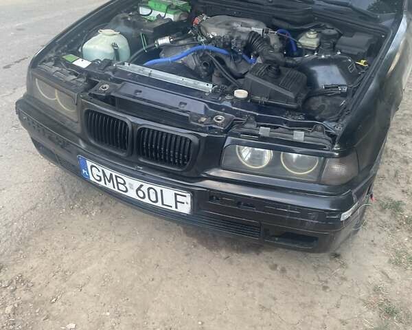Чорний БМВ 3 Серія, об'ємом двигуна 1.6 л та пробігом 424 тис. км за 1400 $, фото 3 на Automoto.ua