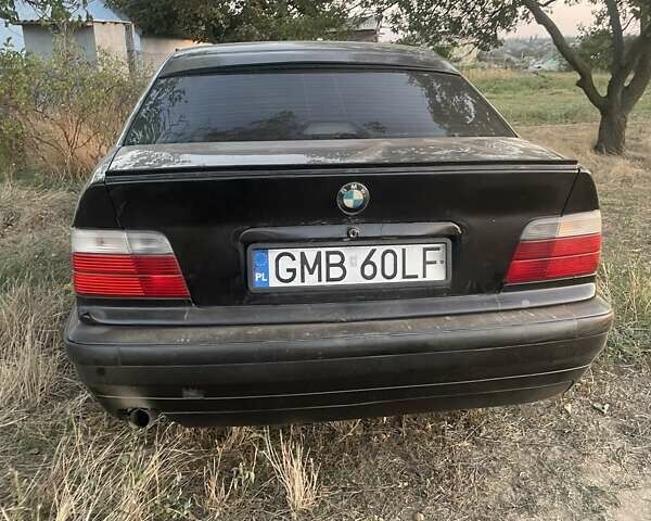 Чорний БМВ 3 Серія, об'ємом двигуна 1.6 л та пробігом 424 тис. км за 1400 $, фото 1 на Automoto.ua