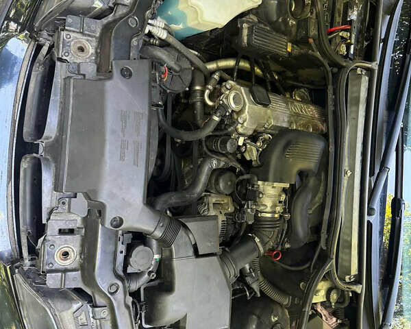 Черный БМВ 3 Серия, объемом двигателя 1.9 л и пробегом 325 тыс. км за 4600 $, фото 13 на Automoto.ua