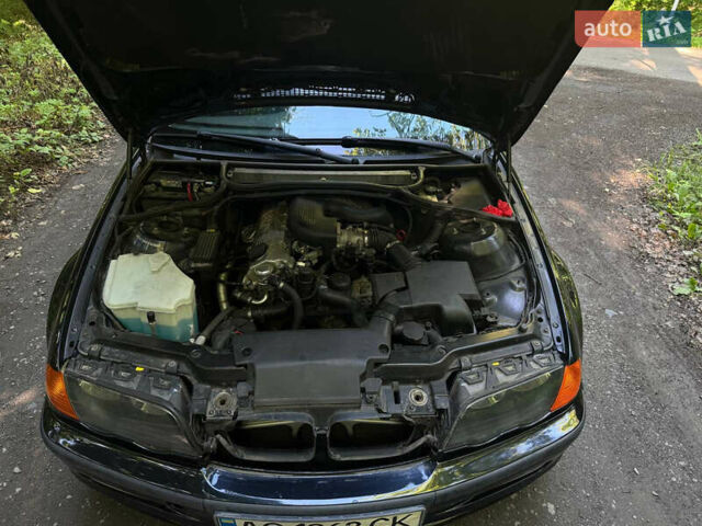 Черный БМВ 3 Серия, объемом двигателя 1.9 л и пробегом 325 тыс. км за 4600 $, фото 10 на Automoto.ua