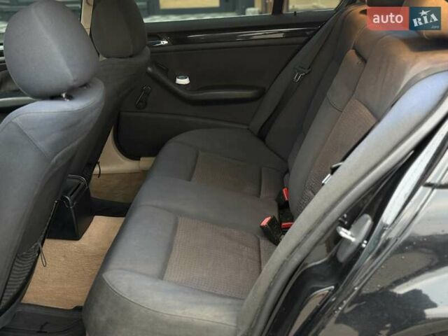 Черный БМВ 3 Серия, объемом двигателя 2.2 л и пробегом 315 тыс. км за 4990 $, фото 7 на Automoto.ua