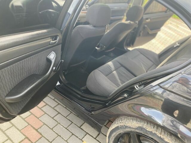 Черный БМВ 3 Серия, объемом двигателя 1.8 л и пробегом 128 тыс. км за 4300 $, фото 5 на Automoto.ua