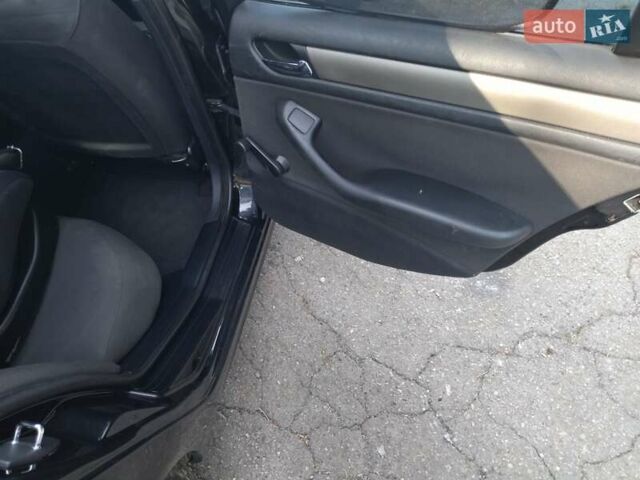 Черный БМВ 3 Серия, объемом двигателя 2 л и пробегом 330 тыс. км за 5450 $, фото 8 на Automoto.ua