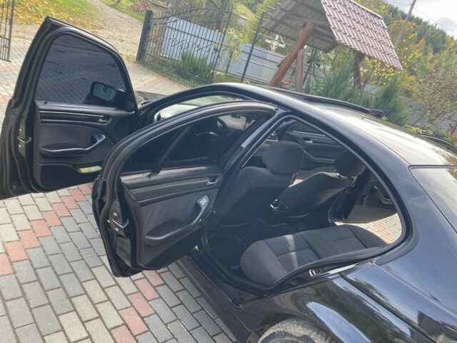 Черный БМВ 3 Серия, объемом двигателя 1.8 л и пробегом 128 тыс. км за 4300 $, фото 6 на Automoto.ua