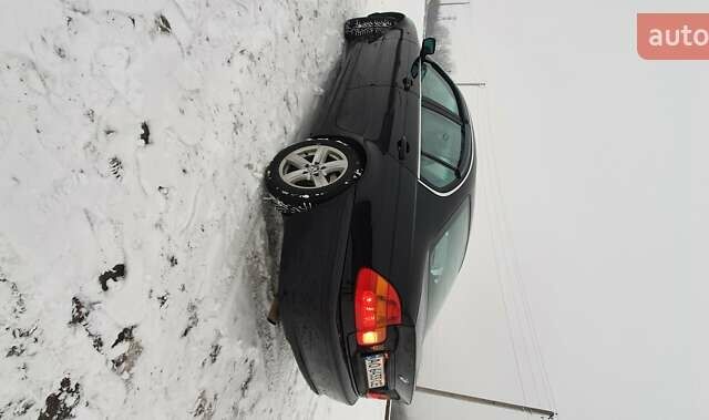 Чорний БМВ 3 Серія, об'ємом двигуна 1.8 л та пробігом 326 тис. км за 5400 $, фото 13 на Automoto.ua