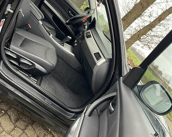 Черный БМВ 3 Серия, объемом двигателя 2 л и пробегом 289 тыс. км за 11794 $, фото 12 на Automoto.ua