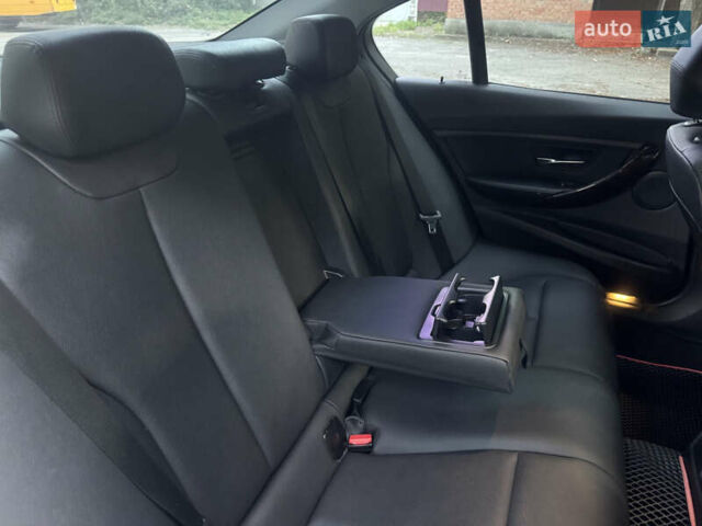 Чорний БМВ 3 Серія, об'ємом двигуна 2 л та пробігом 225 тис. км за 11800 $, фото 48 на Automoto.ua