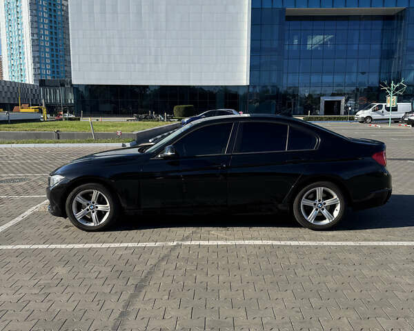 Чорний БМВ 3 Серія, об'ємом двигуна 2 л та пробігом 172 тис. км за 11500 $, фото 5 на Automoto.ua