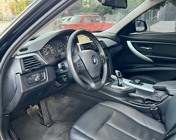 Чорний БМВ 3 Серія, об'ємом двигуна 2 л та пробігом 185 тис. км за 11700 $, фото 24 на Automoto.ua