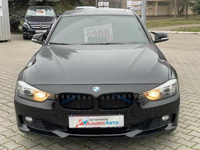 Черный БМВ 3 Серия, объемом двигателя 2 л и пробегом 165 тыс. км за 12300 $, фото 1 на Automoto.ua