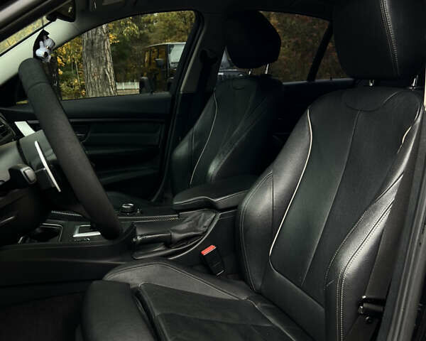 Черный БМВ 3 Серия, объемом двигателя 2 л и пробегом 297 тыс. км за 13600 $, фото 8 на Automoto.ua