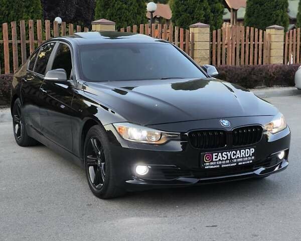 Чорний БМВ 3 Серія, об'ємом двигуна 2 л та пробігом 150 тис. км за 11950 $, фото 1 на Automoto.ua