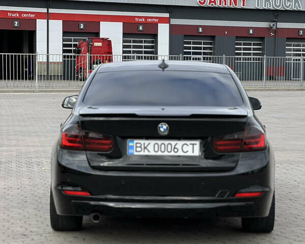 Черный БМВ 3 Серия, объемом двигателя 2 л и пробегом 297 тыс. км за 13600 $, фото 4 на Automoto.ua