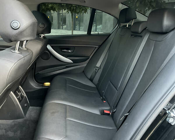 Чорний БМВ 3 Серія, об'ємом двигуна 2 л та пробігом 185 тис. км за 11700 $, фото 19 на Automoto.ua