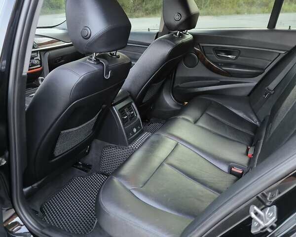 Чорний БМВ 3 Серія, об'ємом двигуна 2 л та пробігом 150 тис. км за 11950 $, фото 13 на Automoto.ua