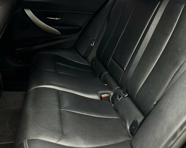 Черный БМВ 3 Серия, объемом двигателя 2 л и пробегом 297 тыс. км за 13600 $, фото 11 на Automoto.ua