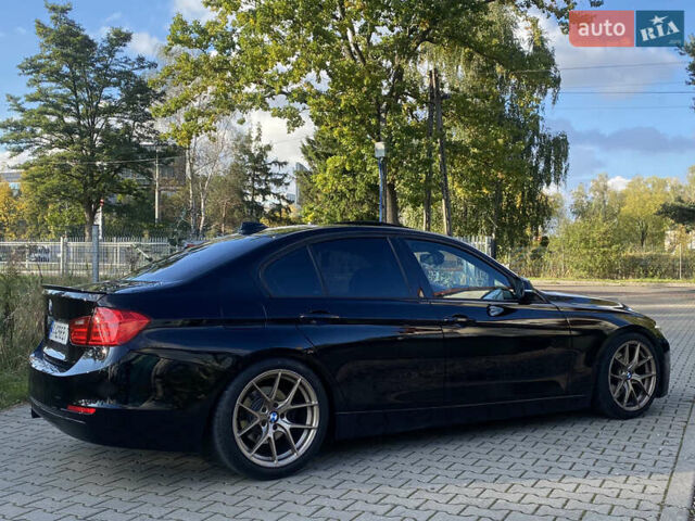 Чорний БМВ 3 Серія, об'ємом двигуна 2 л та пробігом 155 тис. км за 12999 $, фото 8 на Automoto.ua