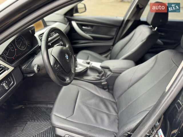 Чорний БМВ 3 Серія, об'ємом двигуна 2 л та пробігом 223 тис. км за 10950 $, фото 22 на Automoto.ua