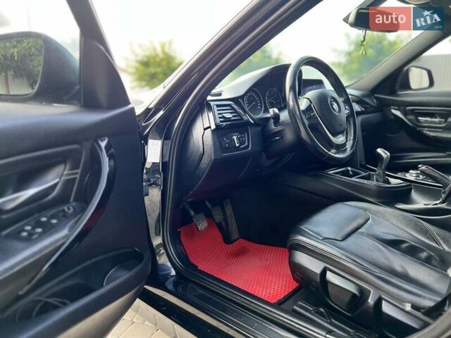Чорний БМВ 3 Серія, об'ємом двигуна 2 л та пробігом 206 тис. км за 12600 $, фото 10 на Automoto.ua