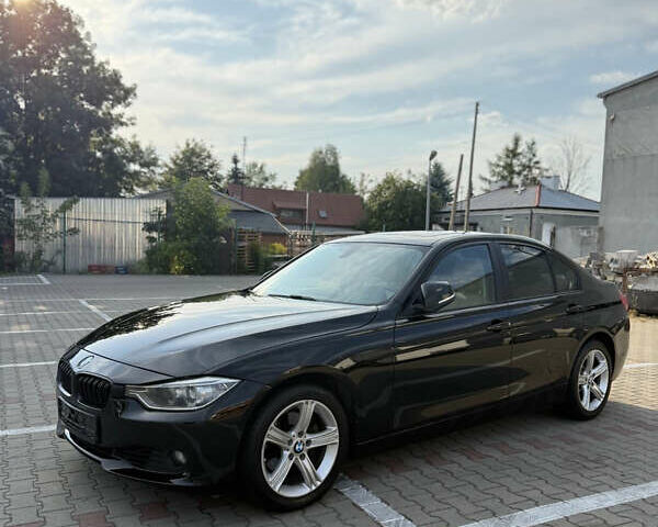 Черный БМВ 3 Серия, объемом двигателя 2 л и пробегом 143 тыс. км за 13855 $, фото 3 на Automoto.ua